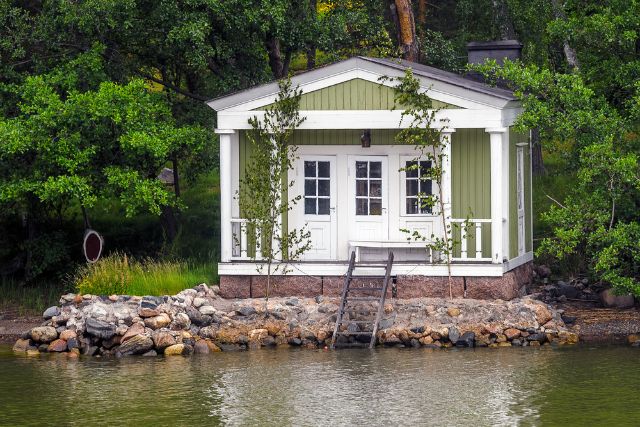 a home surrounded by water